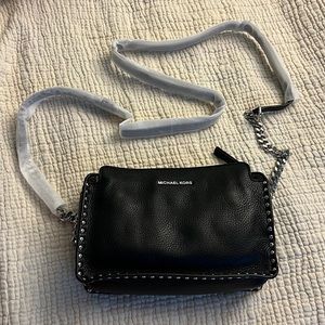Brand NEW never been used Michael Kors black leather studded Astor messenger bag